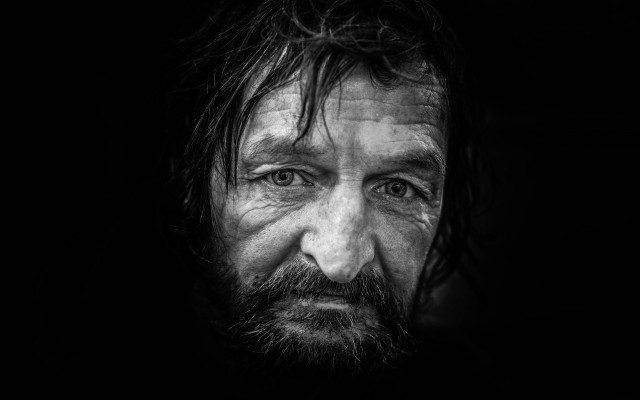 Bearded man long hair serious free wallpaper for desktop - medium preview image