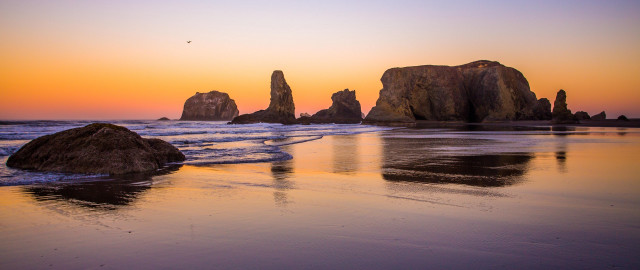Bascove beach rocks water sunset free wallpaper for desktop - medium preview image