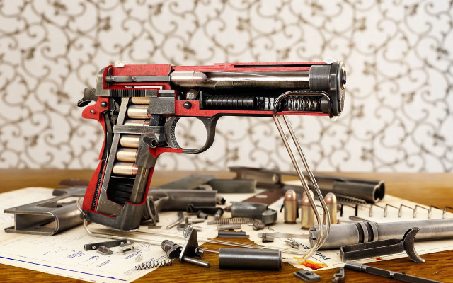 Toy gun tools table wallpapered free wallpaper for desktop - medium preview image