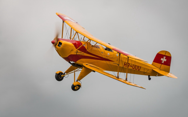 Yellow airplane red cross cloudy free wallpaper for desktop - medium preview image