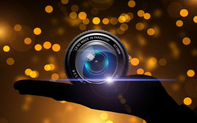 Hand camera lens bokeh city free wallpaper for desktop - medium preview image