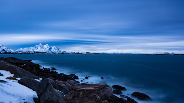 Rocky shore snow mountains night free wallpaper for desktop - medium preview image