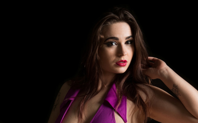 Woman purple top hand head free wallpaper for desktop - medium preview image