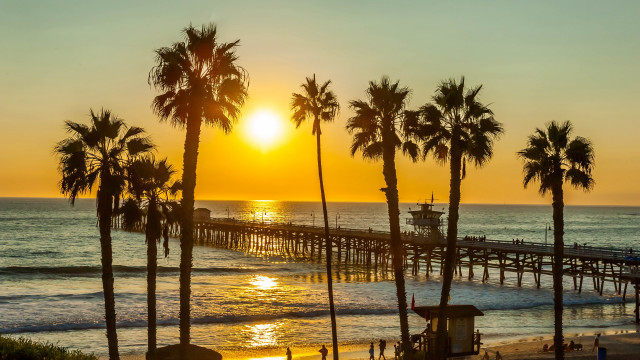 Pier palm trees sunset beach #2 free wallpaper for desktop - medium preview image