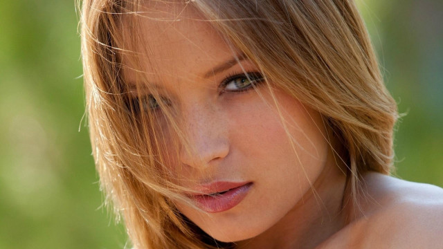 Woman blowing hair posing photorealistic free wallpaper for desktop - medium preview image