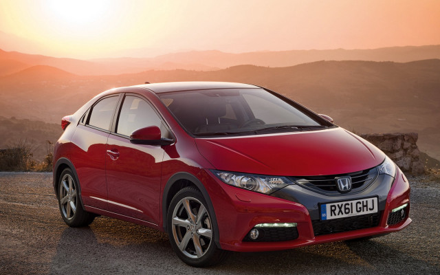 Red car mountains sunset light free wallpaper for desktop - medium preview image