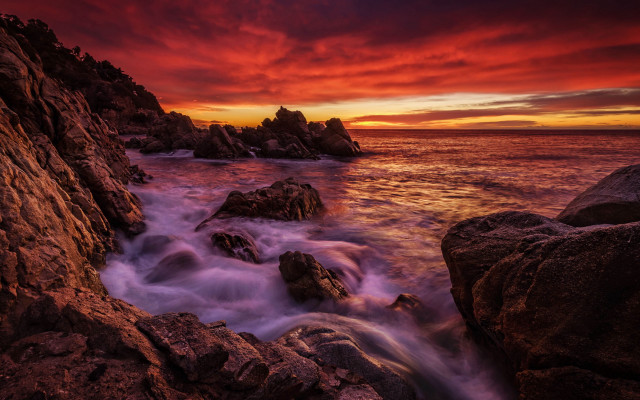 Red sky ocean rocks water free wallpaper for desktop - medium preview image