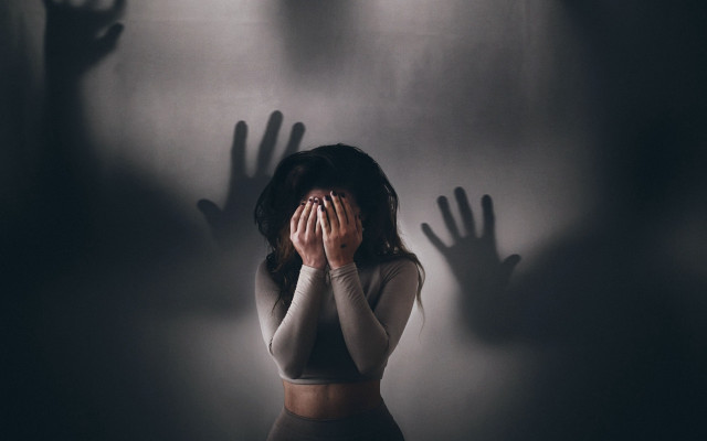 Woman hiding face shadow hands free wallpaper for desktop - medium preview image