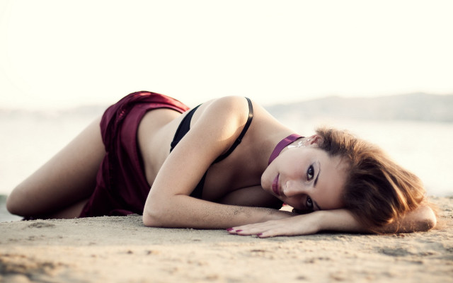 Beach bikini woman laying sand free wallpaper for desktop - medium preview image
