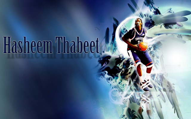 Basketball player holding ball air free wallpaper for desktop - medium preview image