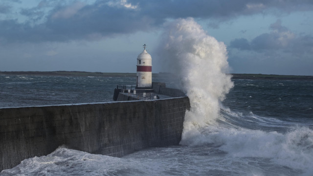 Lighthouse wave ocean concrete wall free wallpaper for desktop - medium preview image