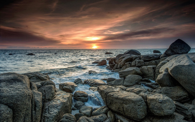 Sunset ocean rocks water cloudy free wallpaper for desktop - medium preview image