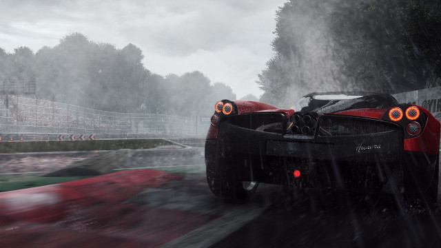 Red sports car rainy road free wallpaper for desktop - medium preview image