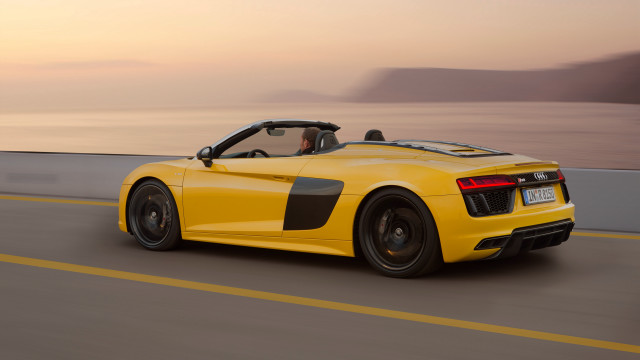 Yellow sports car ocean sunset free wallpaper for desktop - medium preview image