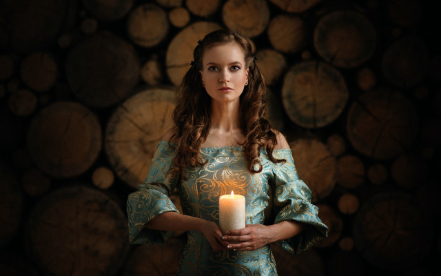 Woman holding lit candle gothic free wallpaper for desktop - medium preview image