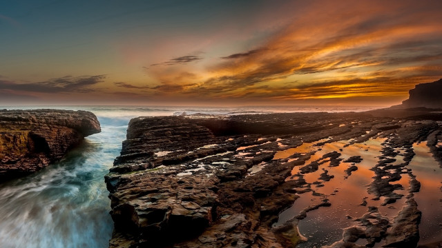 Sunset rocky beach water cliff #3 free wallpaper for desktop - medium preview image