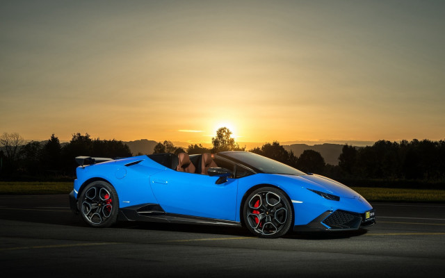 Blue sports car sunset parking free wallpaper for desktop - medium preview image