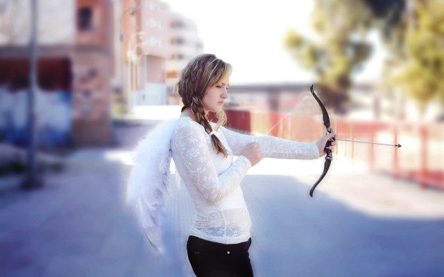 Woman bow arrow street corner free wallpaper for desktop - medium preview image