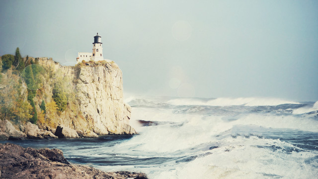 Lighthouse cliff waves beach ocean free wallpaper for desktop - medium preview image
