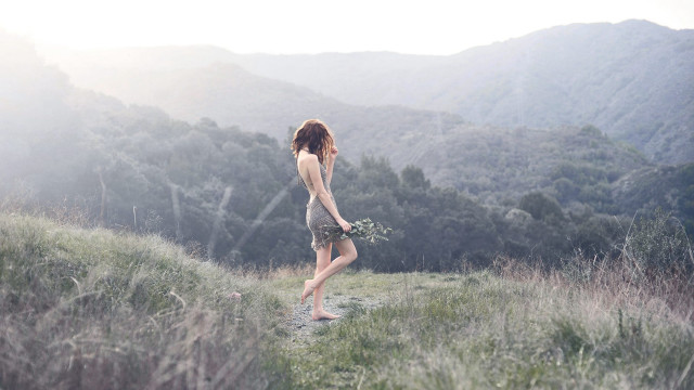 Woman field bouquet mountains nature free wallpaper for desktop - medium preview image