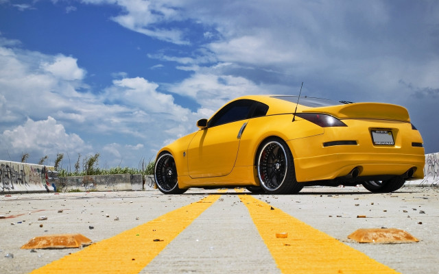 Yellow sports car road clouds free wallpaper for desktop - medium preview image