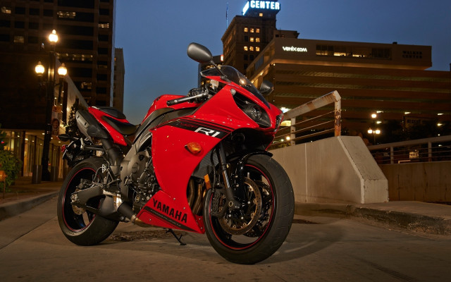 Red motorcycle cityscape night lit free wallpaper for desktop - medium preview image