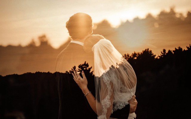 Bride groom kissing sunset trees free wallpaper for desktop - medium preview image
