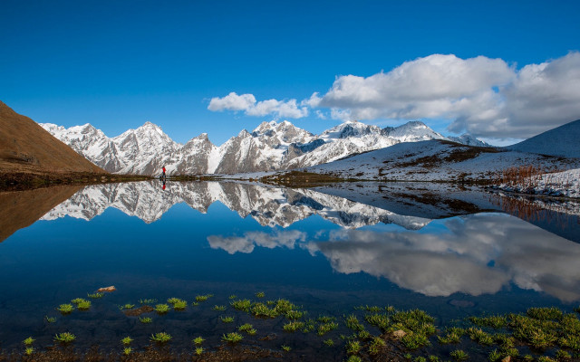 Mountain lake snow peak person free wallpaper for desktop - medium preview image