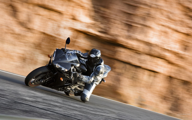 Man motorcycle curvy road rockwall free wallpaper for desktop - medium preview image