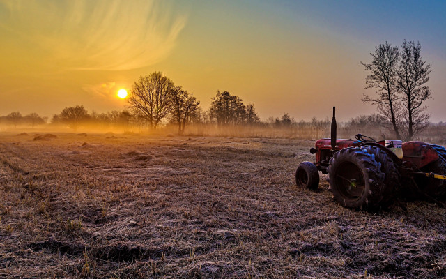 Tractor field sunset fog cityscape free wallpaper for desktop - medium preview image