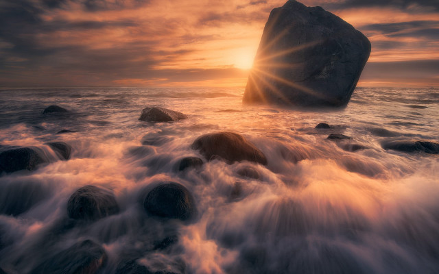 Rock water sunset volumetric light free wallpaper for desktop - medium preview image