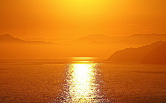 Sunset mountains ocean boat sky free wallpaper for desktop - medium preview image