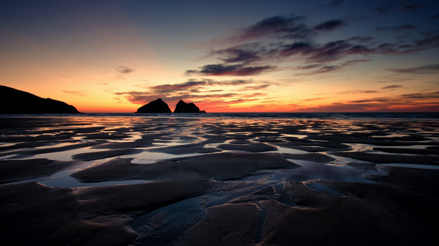 Sunset beach rock formation mountains free wallpaper for desktop - medium preview image