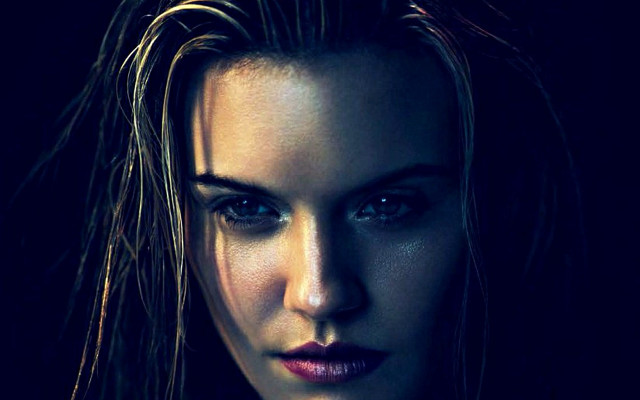 Woman black shirt serious face free wallpaper for desktop - medium preview image