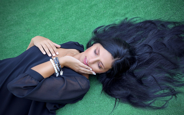 Woman blowing hair black dress free wallpaper for desktop - medium preview image