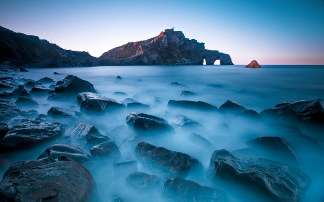 Rocky beach mountain horizon water free wallpaper for desktop - medium preview image