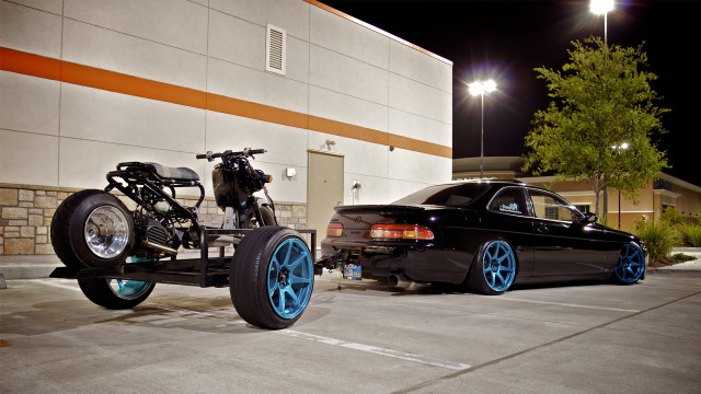 Parked car motorcycle trailer building free wallpaper for desktop - medium preview image