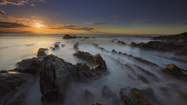 Sunset rocky beach waves horizon free wallpaper for desktop - medium preview image