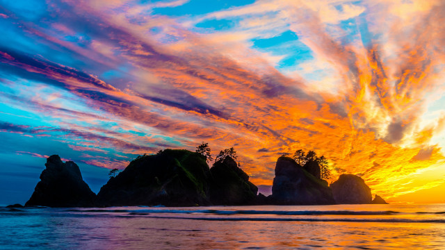 Colorful sunset beach rocks trees free wallpaper for desktop - medium preview image