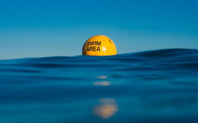Yellow buoy ocean swim sign free wallpaper for desktop - medium preview image