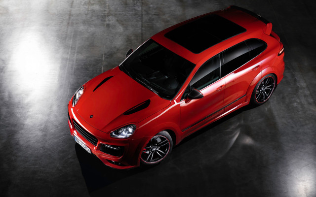 Red car above dark surface free wallpaper for desktop - medium preview image