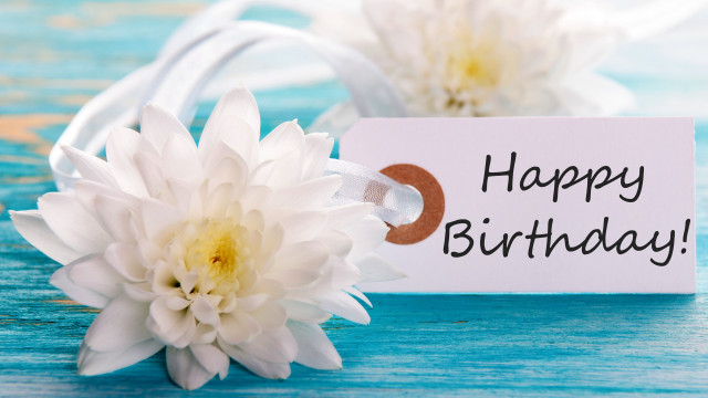 White flower birthday sign beach free wallpaper for desktop - medium preview image
