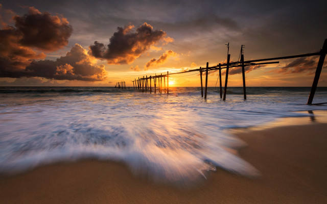 Pier waves sunset clouds beach free wallpaper for desktop - medium preview image