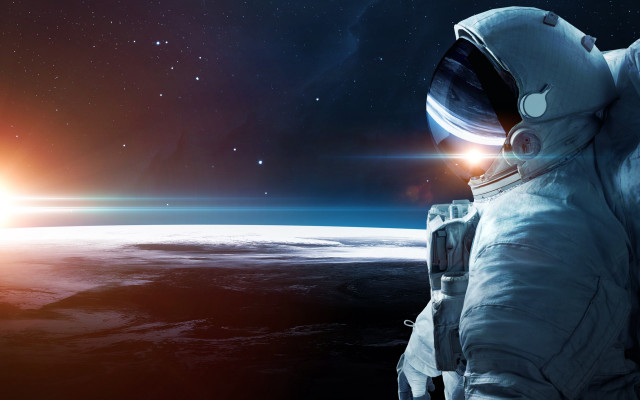 Astronaut sun earth space station free wallpaper for desktop - medium preview image