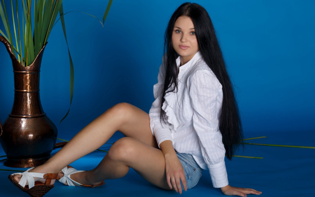 Woman sitting vase plant blue free wallpaper for desktop - medium preview image