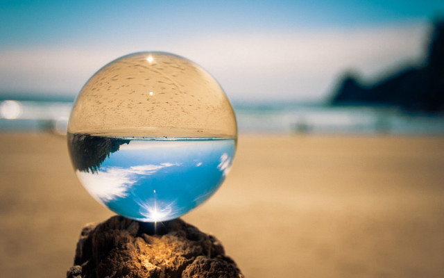 Glass ball wooden stump beach free wallpaper for desktop - medium preview image