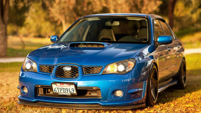 Blue car autumn leaves outdoors free wallpaper for desktop - medium preview image