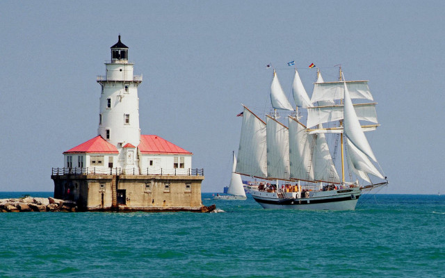 Lighthouse sailboat ocean rock pier free wallpaper for desktop - medium preview image