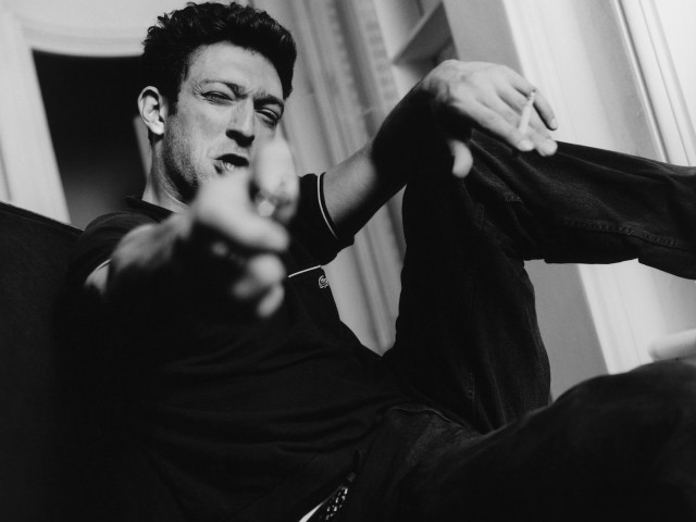 Man pointing camera hand hip free wallpaper for desktop - medium preview image