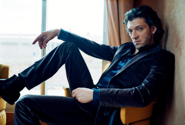 Man suit chair window hand free wallpaper for desktop - medium preview image